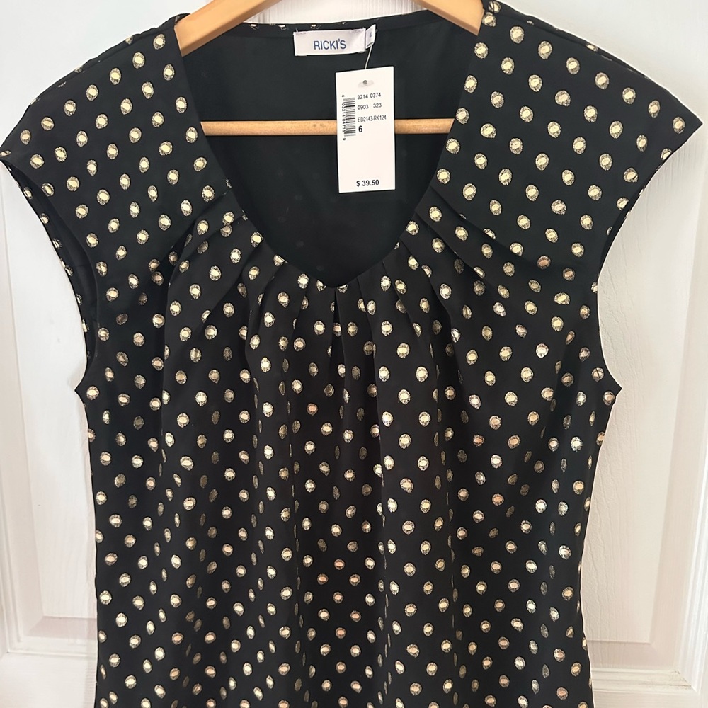 Ricki’s blouse, size small